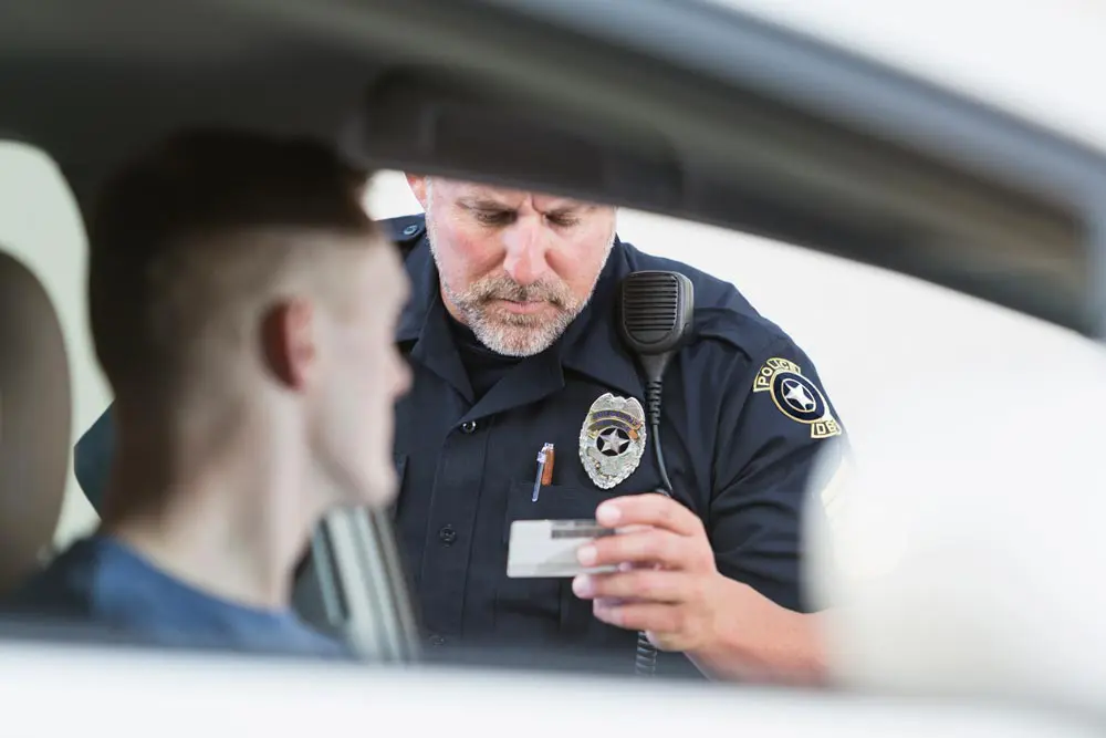 Officer checking driver's license